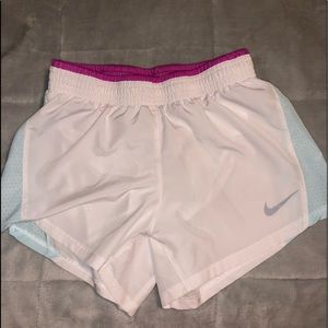 White Nike shorts